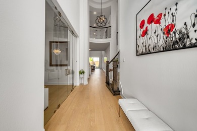 Impressive two-story entry into this stunning, model-like home - photo 10