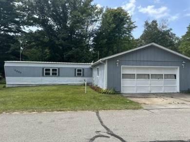 Lake Home For Sale in Gladwin, Michigan