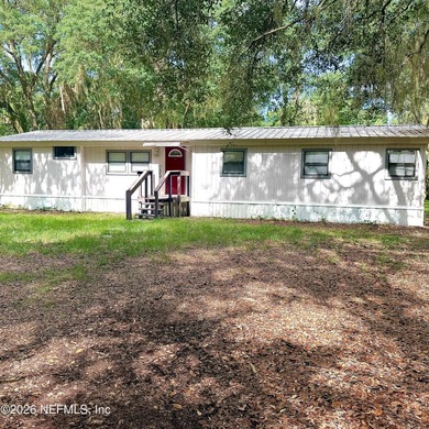 This 3-bedroom, 2-bathroom double-wide home offers a spacious 1 - photo 3