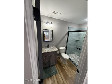 This Beautiful home, nestled on a wooded 5.4 acre lot is like - photo 17