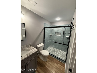 This Beautiful home, nestled on a wooded 5.4 acre lot is like - photo 18