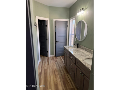 This Beautiful home, nestled on a wooded 5.4 acre lot is like - photo 21