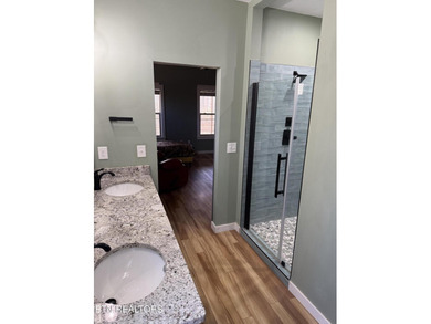 This Beautiful home, nestled on a wooded 5.4 acre lot is like - photo 24