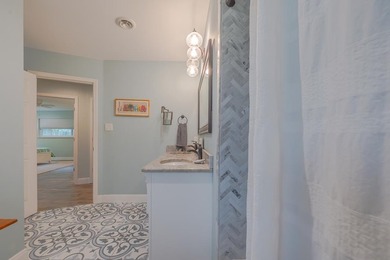 Welcome to this beautifully updated coastal rambler, where - photo 49
