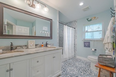 Welcome to this beautifully updated coastal rambler, where - photo 50
