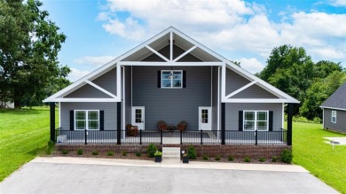Lake Home For Sale in Scottsville, Kentucky