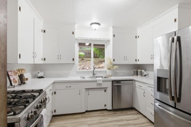 This beautifully designed redwood home is nestled along the San - photo 11