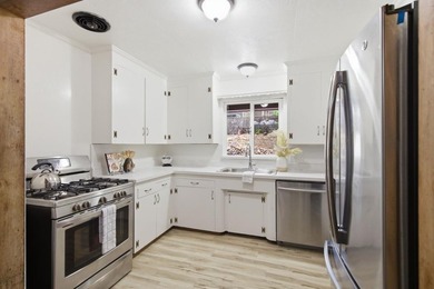 This beautifully designed redwood home is nestled along the San - photo 12