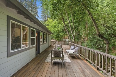 This beautifully designed redwood home is nestled along the San - photo 32