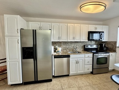 Newly refreshed top floor unit with fabulous intracoastal views - photo 7