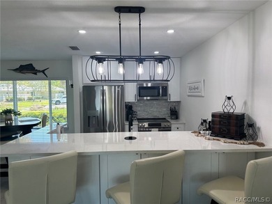 Check out this 1,584 sq.ft WATERFRONT, FULLY FURNISHED 2/2 - photo 2