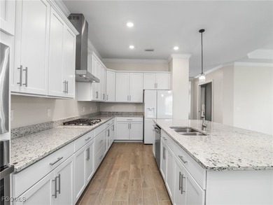 Live where others vacation in this Calusa model, overlooking the - photo 11