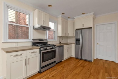Many Upgrades Including 2 Separate Efficiency Boilers & Each - photo 1