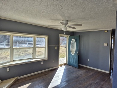 This small home with 4.45 acres is located in a great location - photo 2