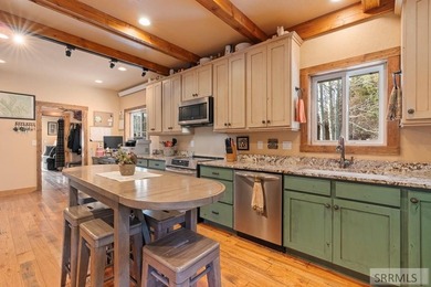 Set on 5 meticulously landscaped acres in breathtaking Swan - photo 27
