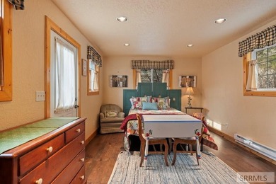 Set on 5 meticulously landscaped acres in breathtaking Swan - photo 33