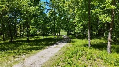 This Iowa acreage for sale offers over 16 mostly wooded acres - photo 6