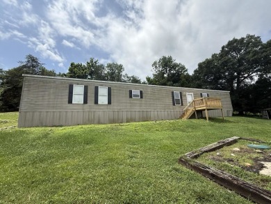 Lake Malone Home Active Under Con in Belton Kentucky