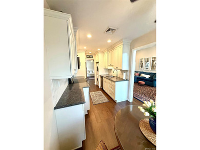 Lovingly maintained 2bd 1 1/2 bath unit located in the desirable - photo 11