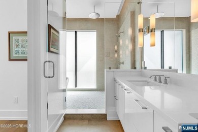 Panoramic ocean views await in this one-of-a-kind, 4-level - photo 13
