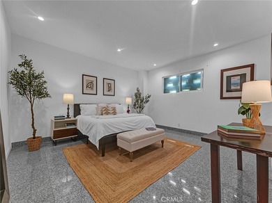 Welcome to this beautifully remodeled condo offering an elevated