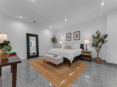 Welcome to this beautifully remodeled condo offering an elevated