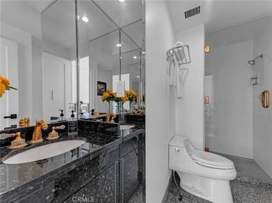Welcome to this beautifully remodeled condo offering an elevated