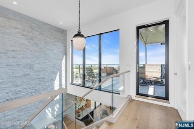 Panoramic ocean views await in this one-of-a-kind, 4-level - photo 30