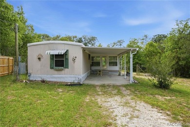 Experience the gold standard of energy efficiency in Homosassa! - photo 1