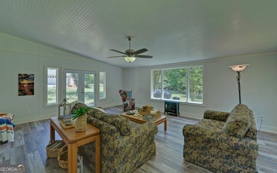 Nestled along the shores of Lake Hartwell, this charming cottage - photo 12