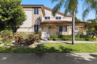 Behind the gates of Boca Pointe, this 3BR/3BA corner townhome - photo 2
