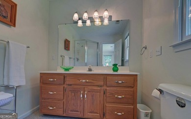 Nestled along the shores of Lake Hartwell, this charming cottage - photo 28