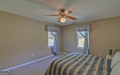 Nestled along the shores of Lake Hartwell, this charming cottage - photo 31