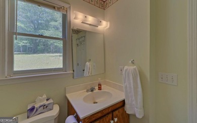 Nestled along the shores of Lake Hartwell, this charming cottage - photo 33