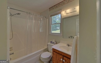 Nestled along the shores of Lake Hartwell, this charming cottage - photo 34