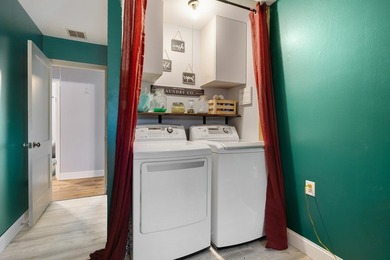 Waterfront Living with Direct Chain O' Lakes Access! Nestled - photo 22