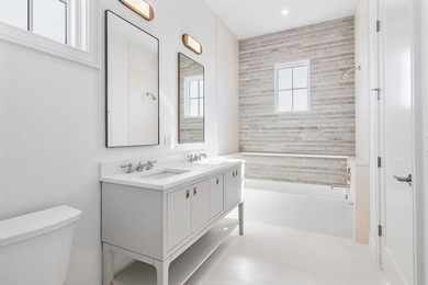 Less than a mile from the beach, this breathtaking new - photo 48