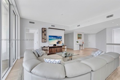 WELCOME HOME to the Four Seasons Private Residence 802. This 2 - photo 7