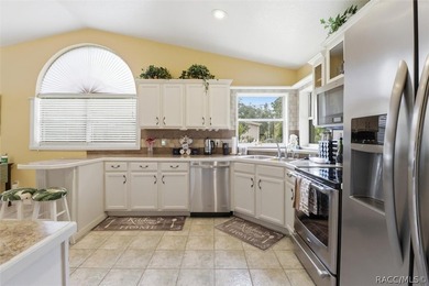 Welcome home to this inviting three-bedroom, two-bath with - photo 17