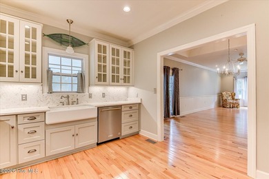 **This stunning brick home truly has it all.** Nestled in one of - photo 18