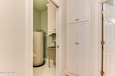 **This stunning brick home truly has it all.** Nestled in one of - photo 21