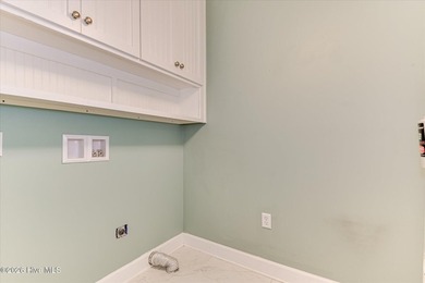**This stunning brick home truly has it all.** Nestled in one of - photo 22