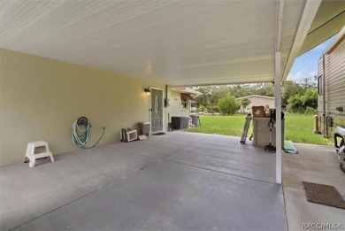 Welcome home to this inviting three-bedroom, two-bath with - photo 40