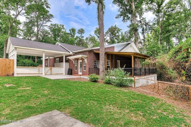 **This stunning brick home truly has it all.** Nestled in one of - photo 45