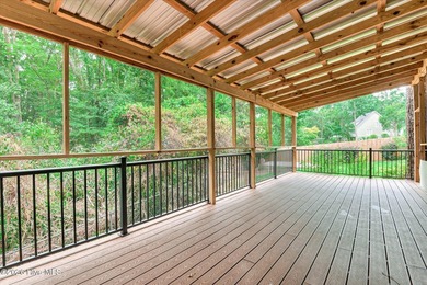 **This stunning brick home truly has it all.** Nestled in one of - photo 47