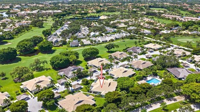 Tucked away in the picturesque Windward Village enclave of - photo 3