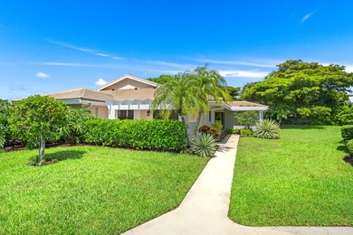 Tucked away in the picturesque Windward Village enclave of - photo 6