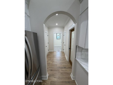 Welcome to this stunning custom-built home where timeless stone - photo 17