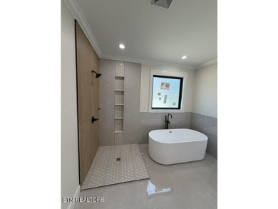 Welcome to this stunning custom-built home where timeless stone - photo 18