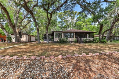 This canal-front home is move in ready and full of character and - photo 4